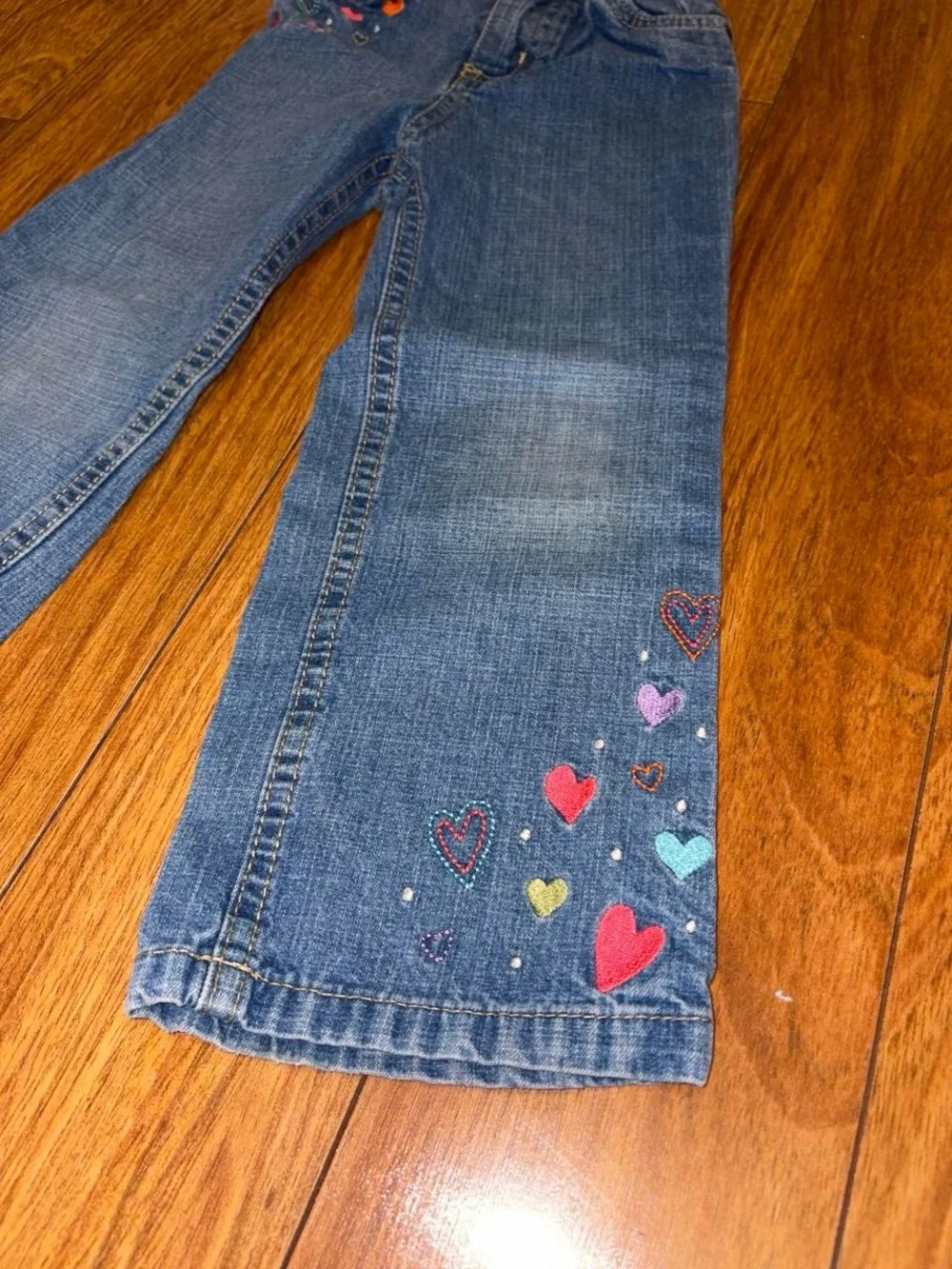 Y2K denim jeans with embroidered hearts
